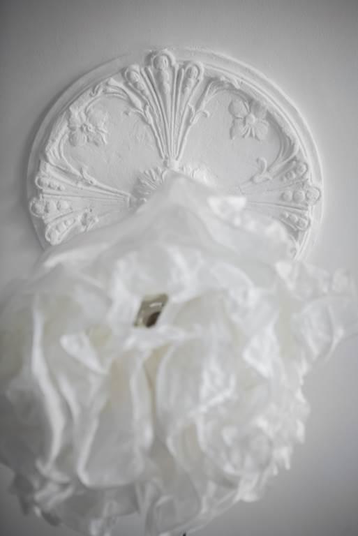 Tre meter upp finns en snygg rosett