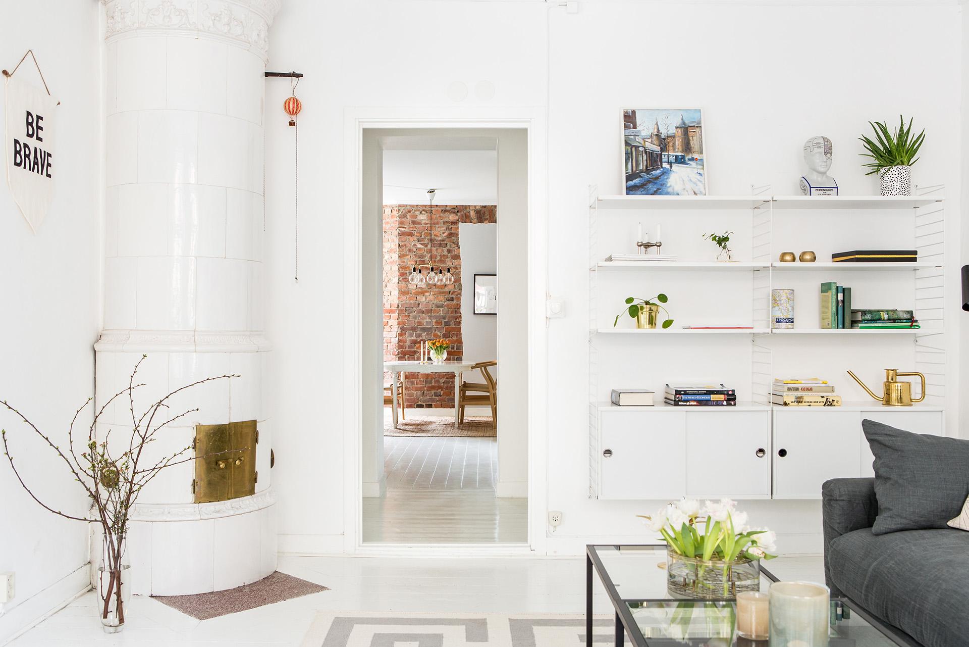 Vit sekelskiftesdröm med bästa läge i Linné